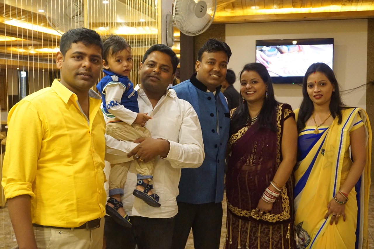 Nandan&rsquo;s family posing for a photograph.
