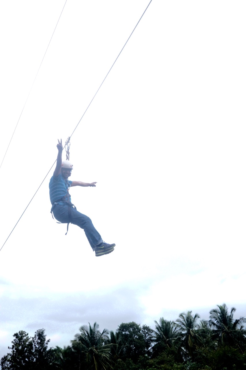 There is a zipline that runs over the lake. This is Mainak posing for the camera.