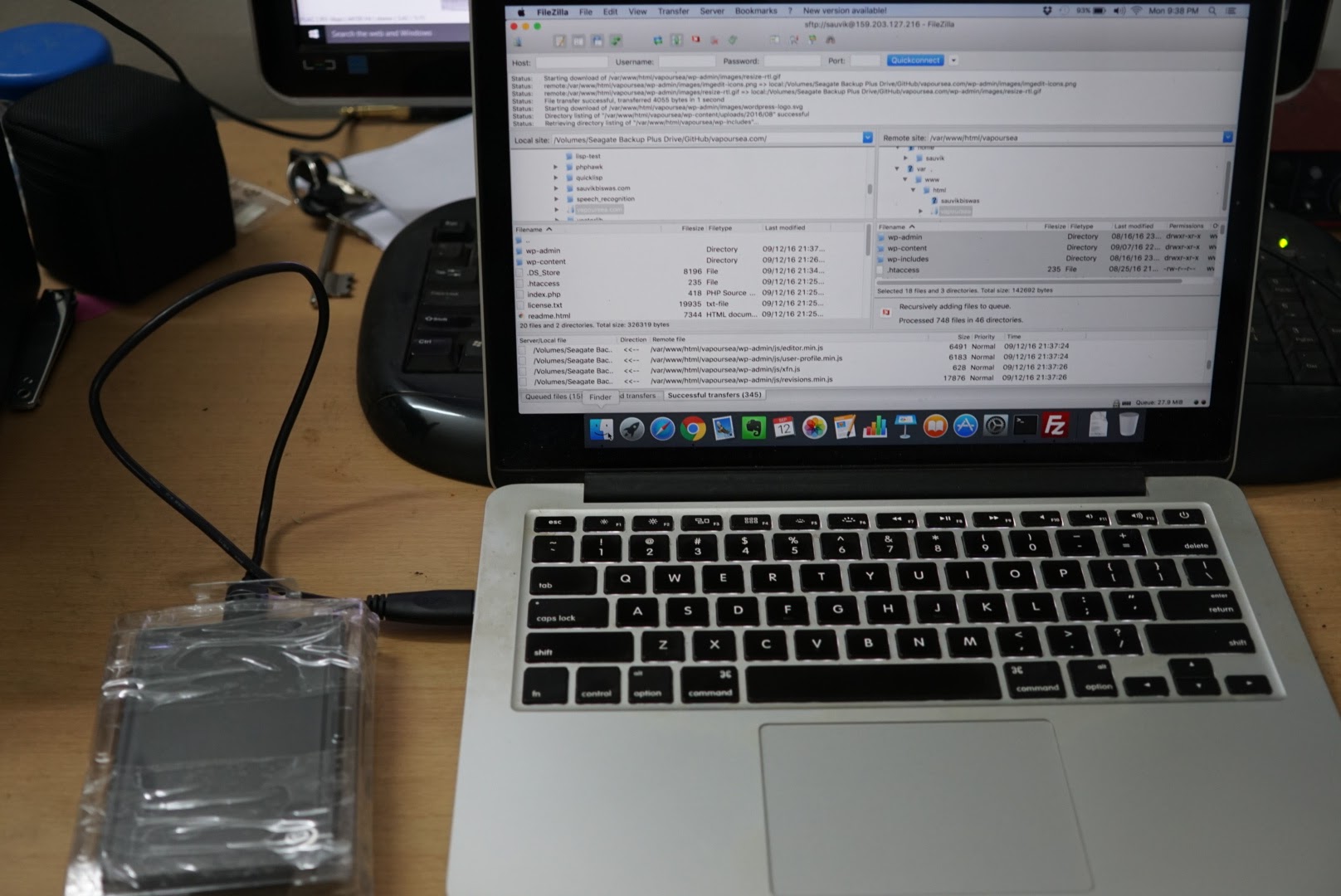That&rsquo;s Filezilla dumping the entire website data onto my new HDD. I don&rsquo;t prefer installing an FTP server. SFTP over a standard SSH pipe is a much safer approach.
