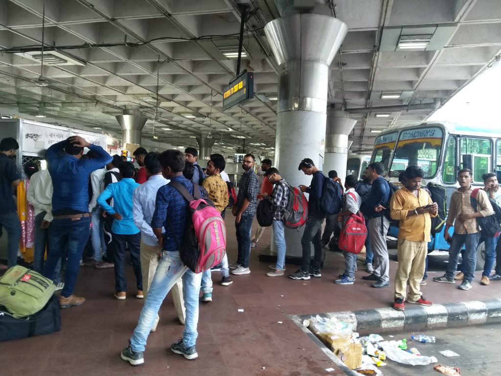 The general commotion and lack of cleanliness at ISBT.