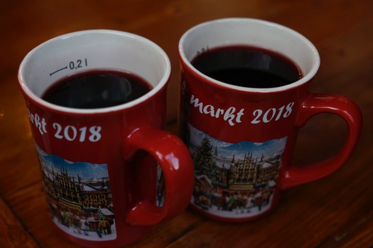 There is a refundable deposit on the cups. We could deposit these cups to any of the shops that sold Glühwein and ask for the refund.