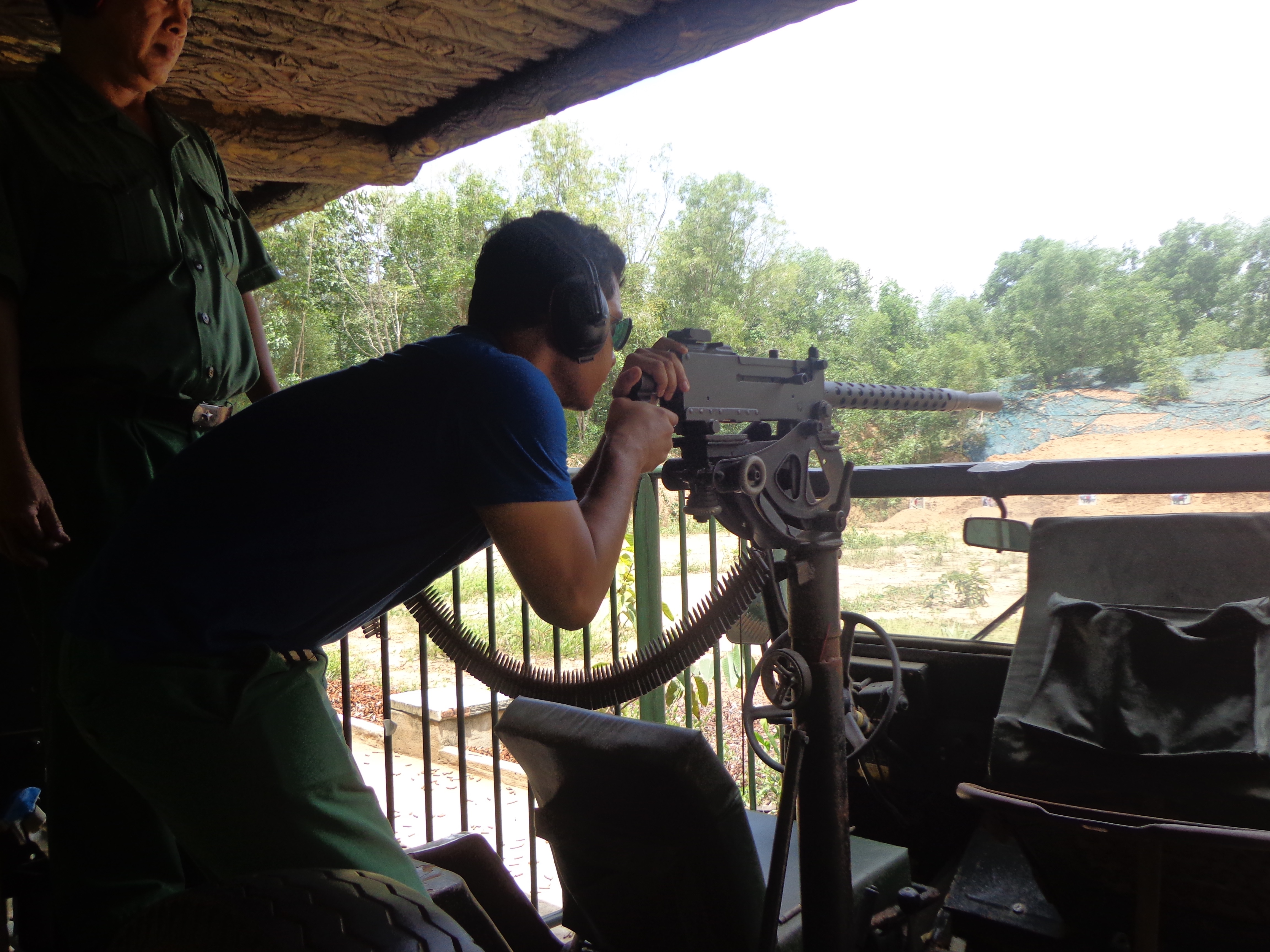 We each spent about 300k VND over 10 rounds for firing this machine gun. Here’s Nandy shooting some bullets.