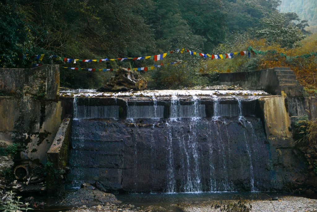 The artificial waterfall that feeds the Dirang hydel power station.