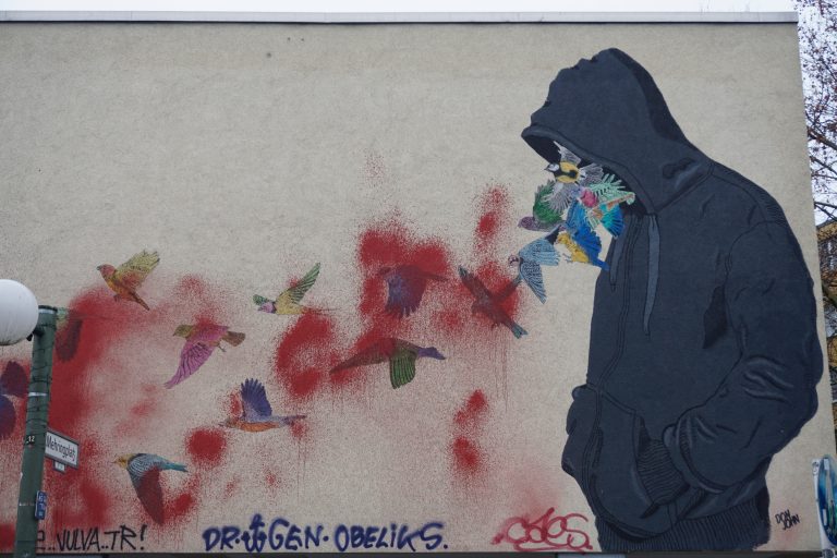 A graffiti near Mehringplatz vandalised by more graffiti.