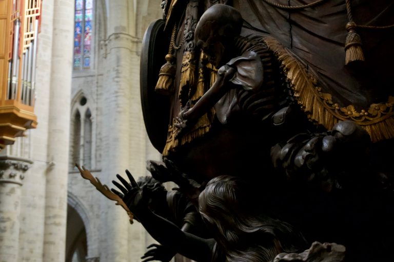 The pulpit was one of the most intricate ones I had seen in the last two weeks. Here is a closeup of one of the sides depicting a skeleton.