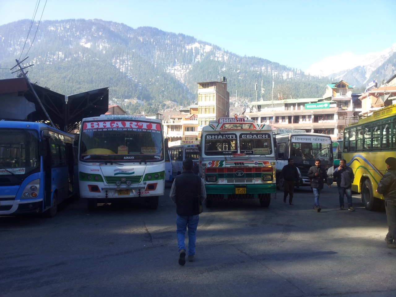 Manali bus stand with the great Himalayas in the background. I rejected the hotel owner&rsquo;s offer and went straight to this place.