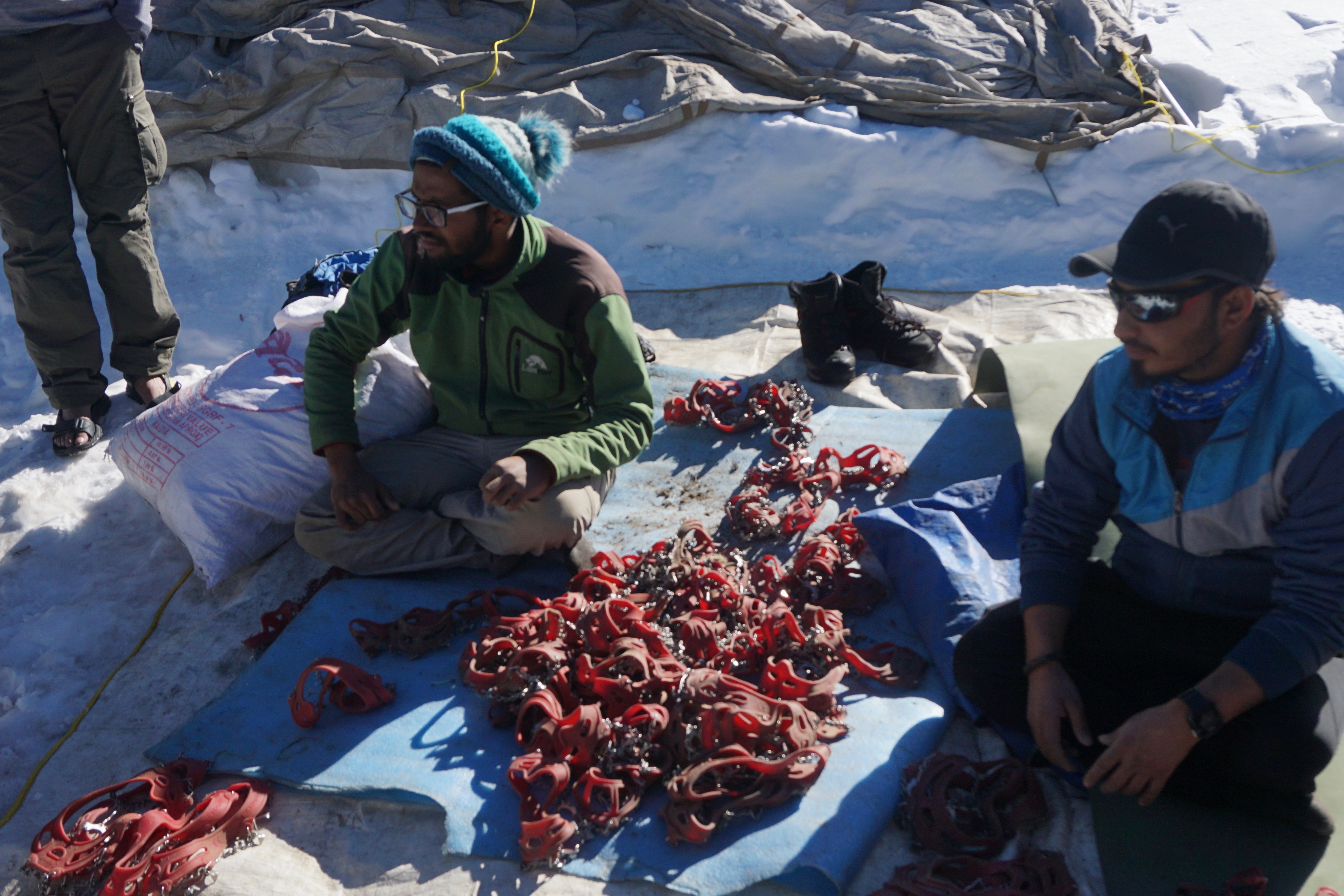 Micro-crampons were distributed according to shoe sizes. They gave a lot of grip on compacted snow.