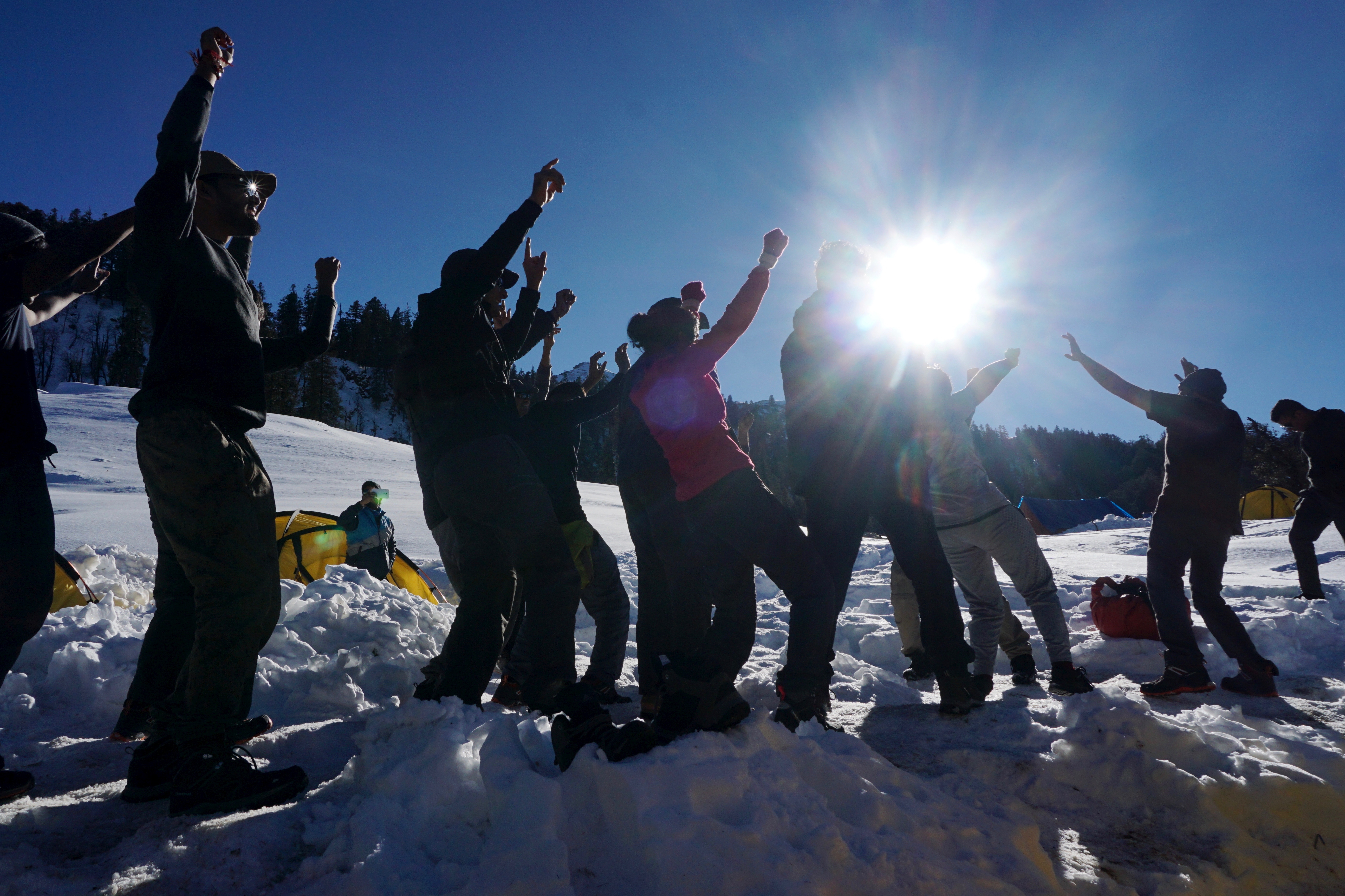 Karthik teaching some dance moves to the trekkers.