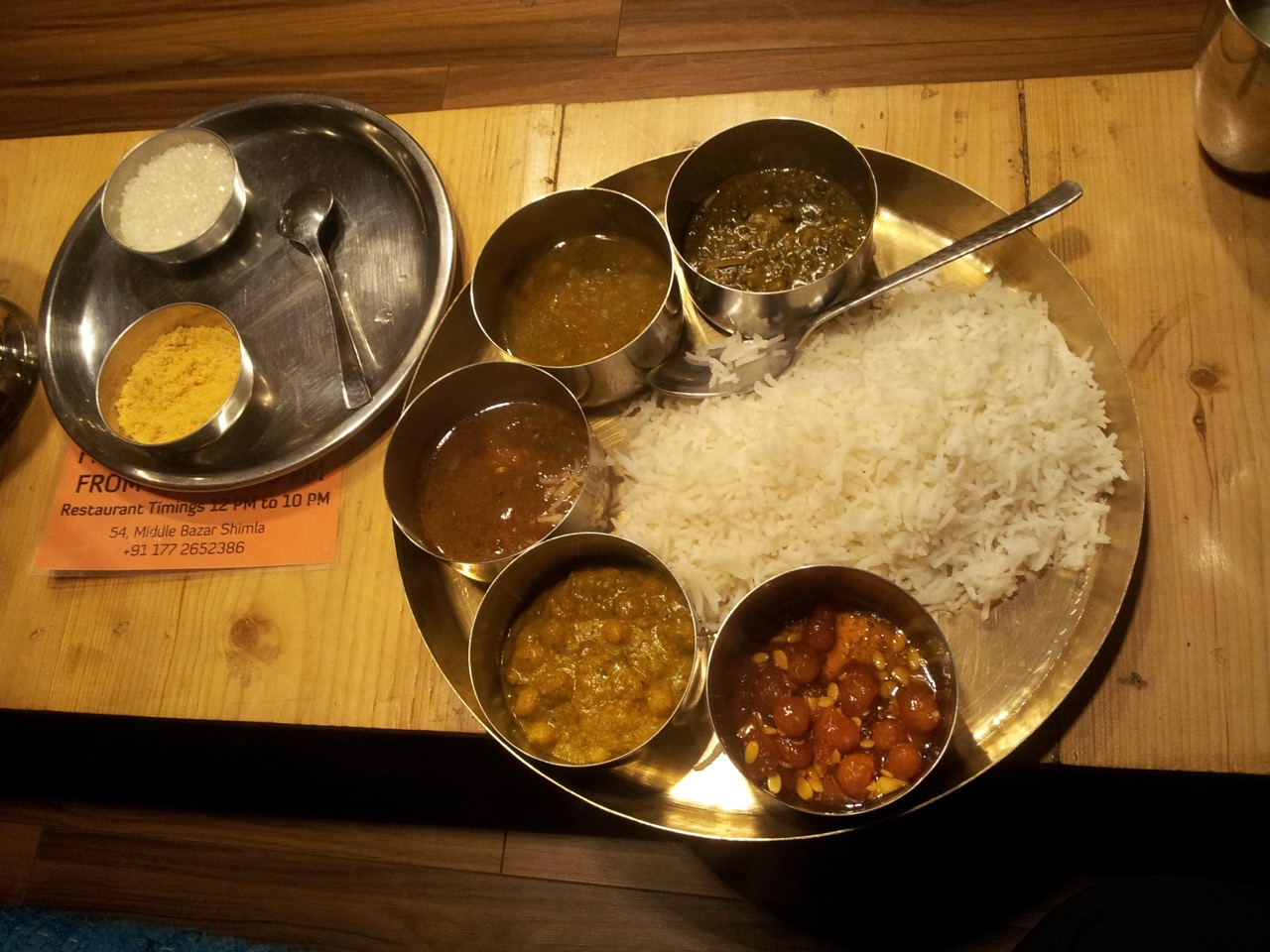Anticlockwise on the thali, Ma ki dal, Chane ki dal, Black chane ki mani, White chane ka manthra and Badana sweet. I had also ordered Kangra Tea. They gave powdered jaggery along with it.