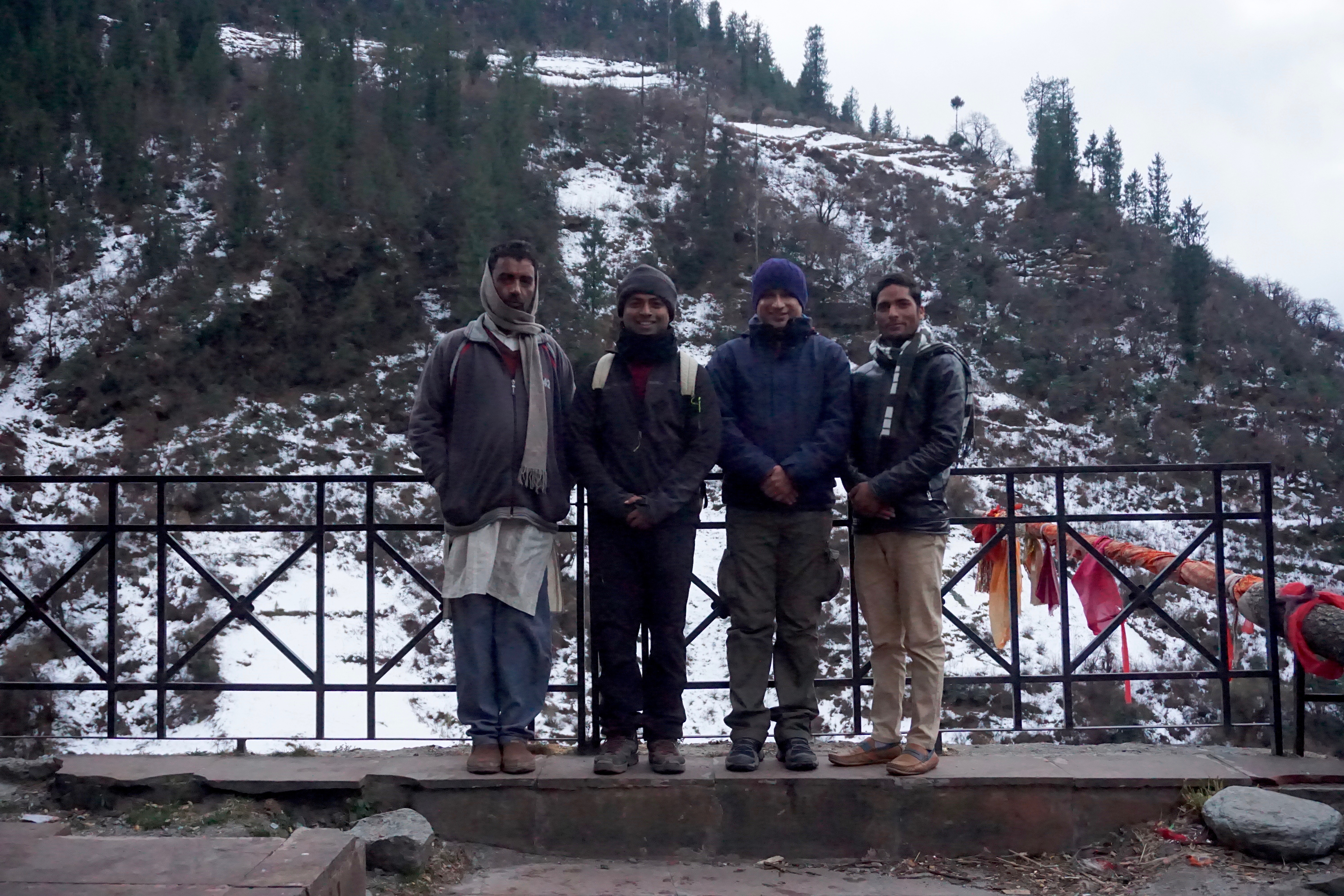 Pandit Raghavanand, me, Shubhajit and Mahavir posing beside the Shani temple.