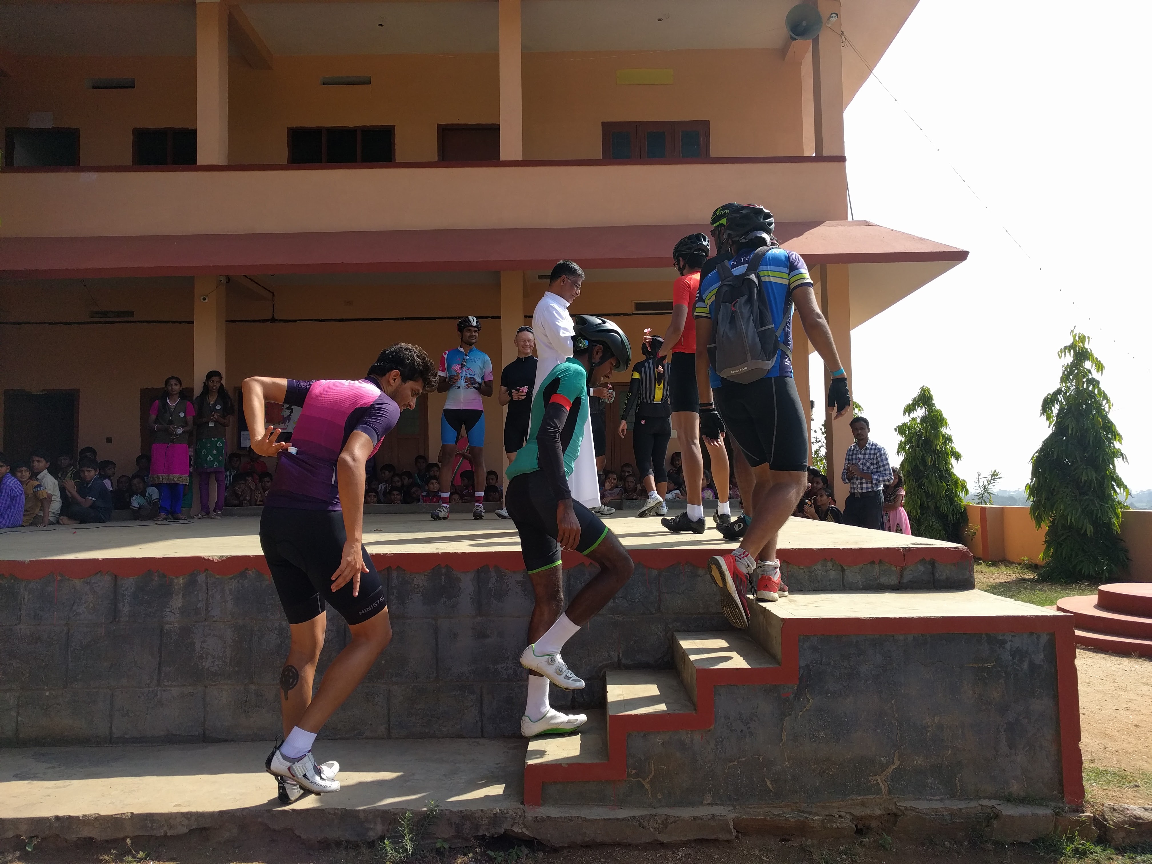 Father Thomas giving us flowers.