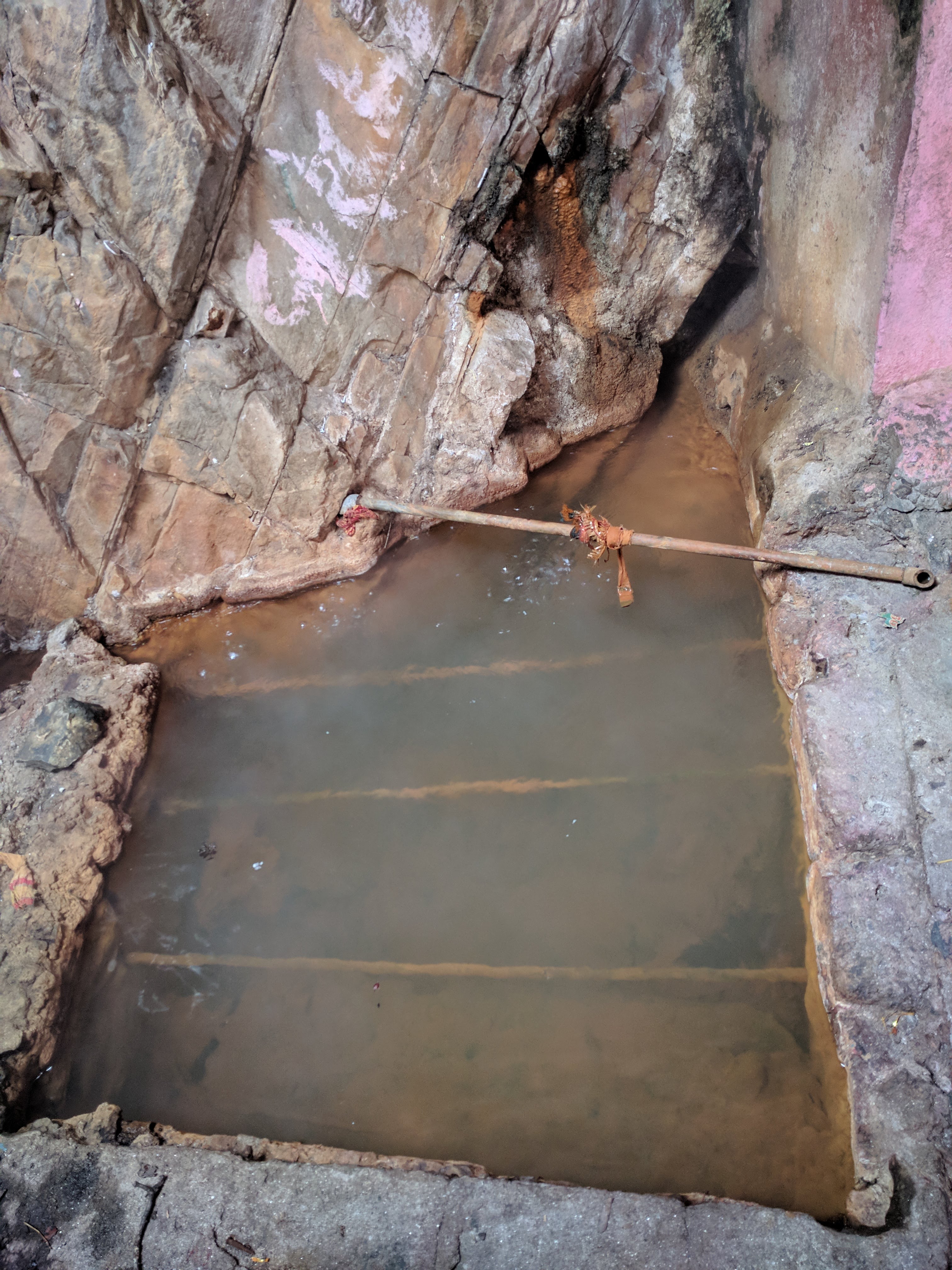 Surya Kund, the hot spring that is the source of hot water for the bath.