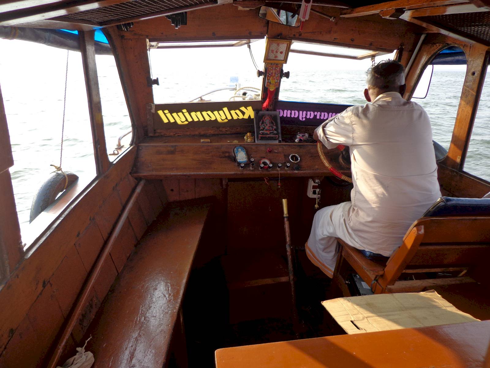 Our driver Babu. He allowed us to steer the boat for sometime.