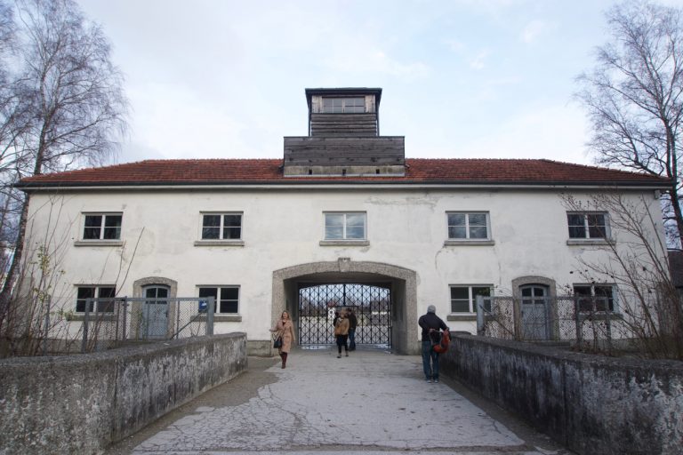 The entry to the camp. The gate bears the inscription, arbeit macht frei or work will make you free.
