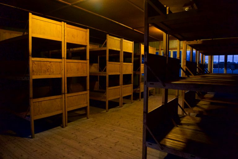 The barracks have been reconstructed. This is the bunker room. There are also reconstructions of the toilets, bath-house and locker rooms.
