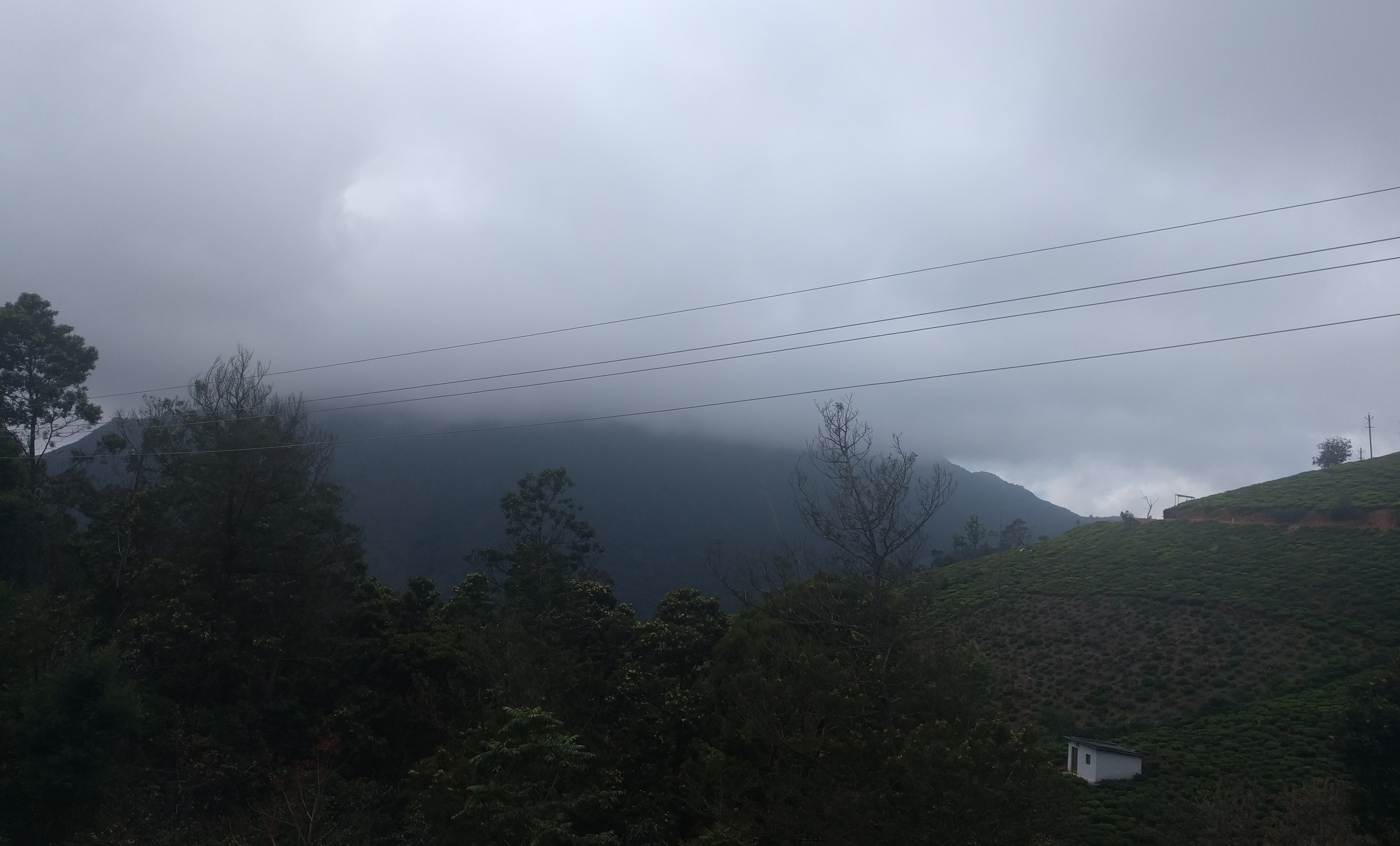 Clouds covering the neighbouring hill.