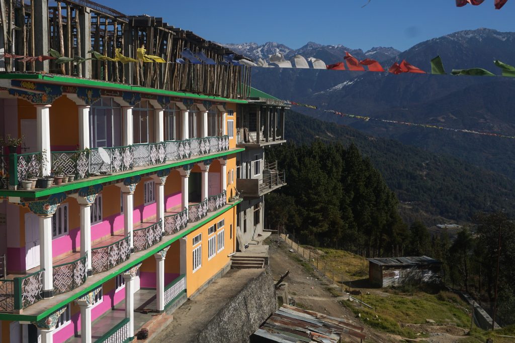 The living quarters of Manjushree Orphanage. The construction on the roof is for a place to dry clothes during rainy season as well as a greenhouse. There is also a football field below.