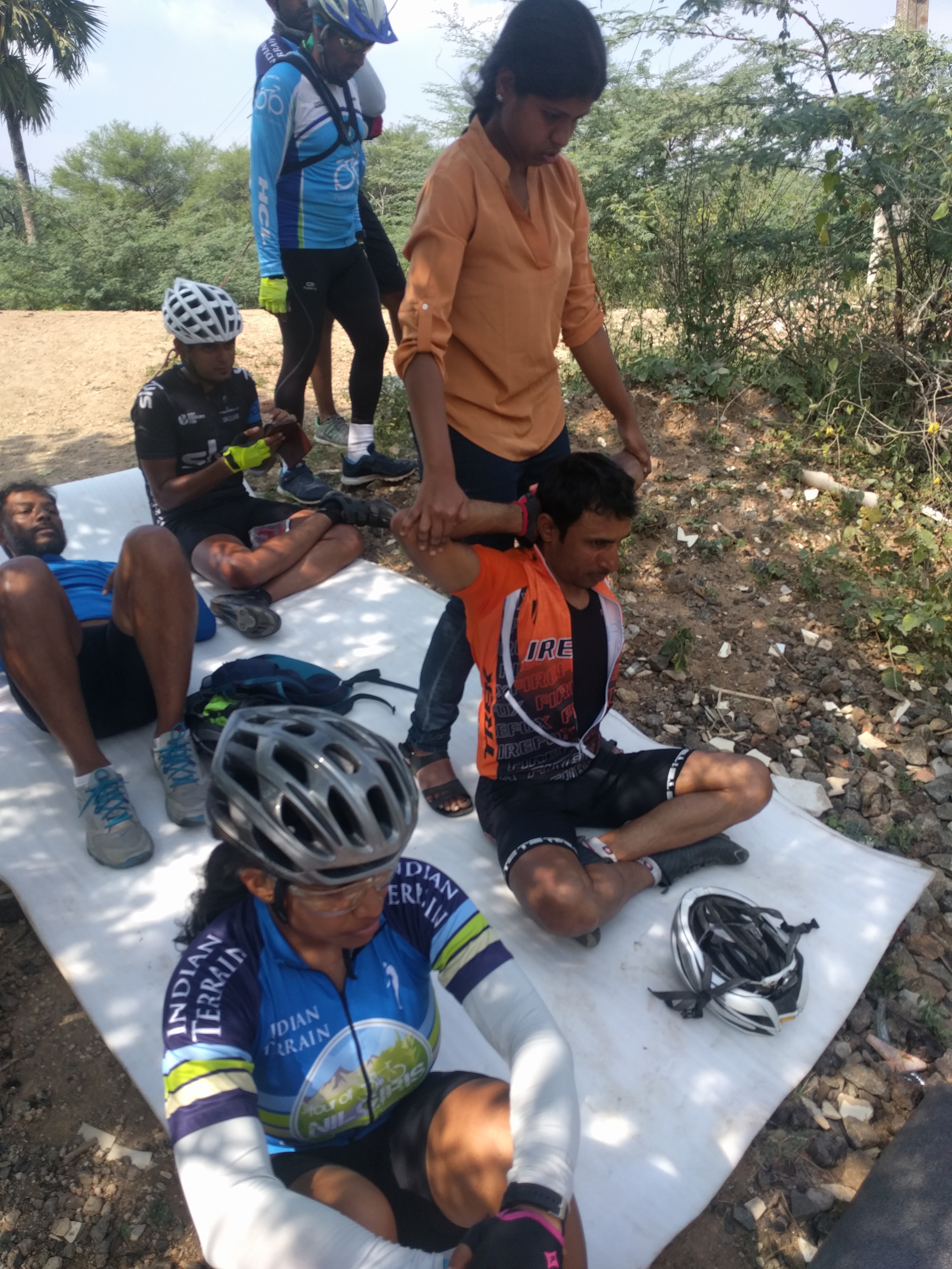 Manjeet getting some stretches from one of the physiotherapists.