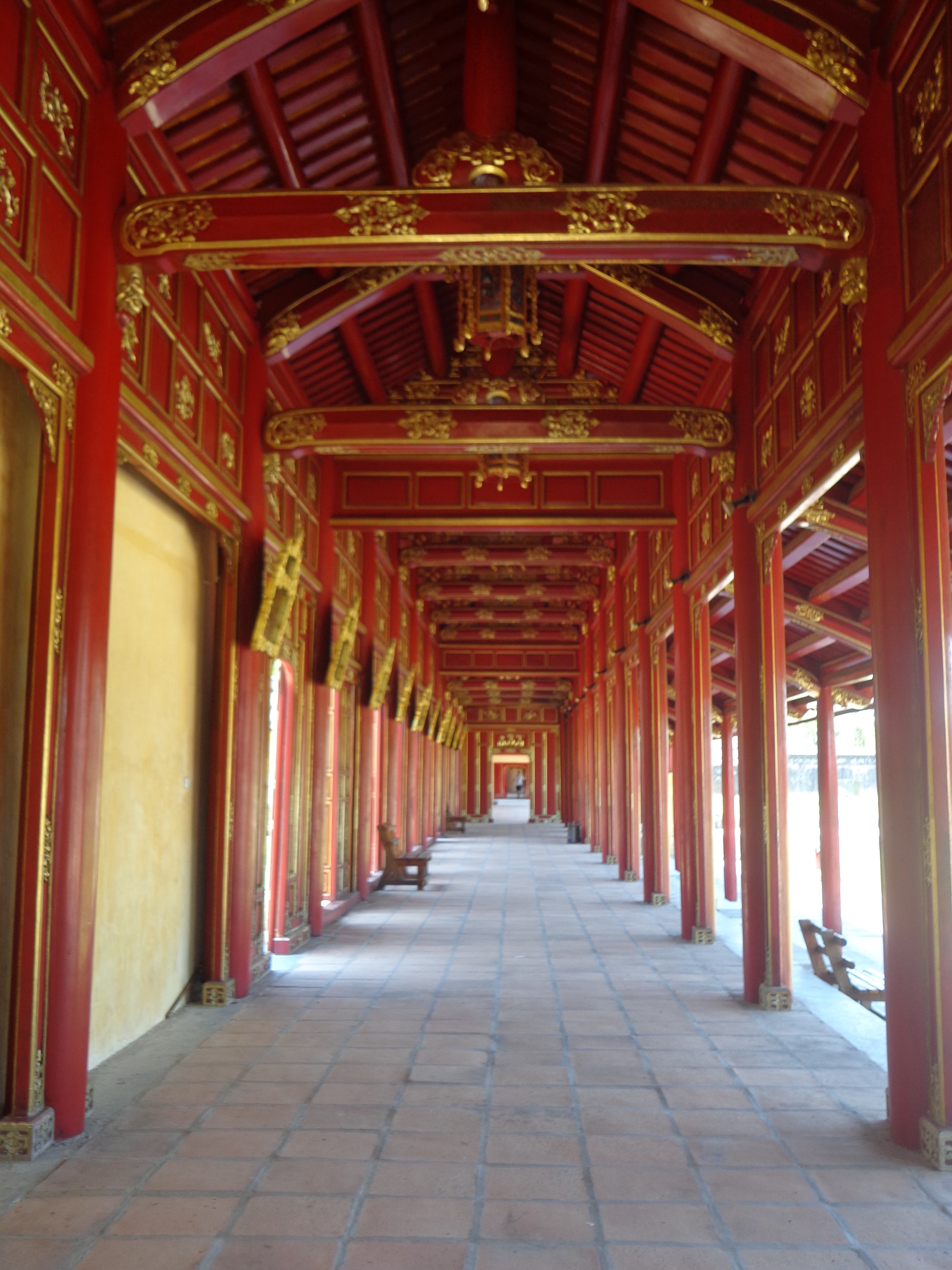 The corridors joining various parts of the palace , temples and shrines are decorated in red and gold.