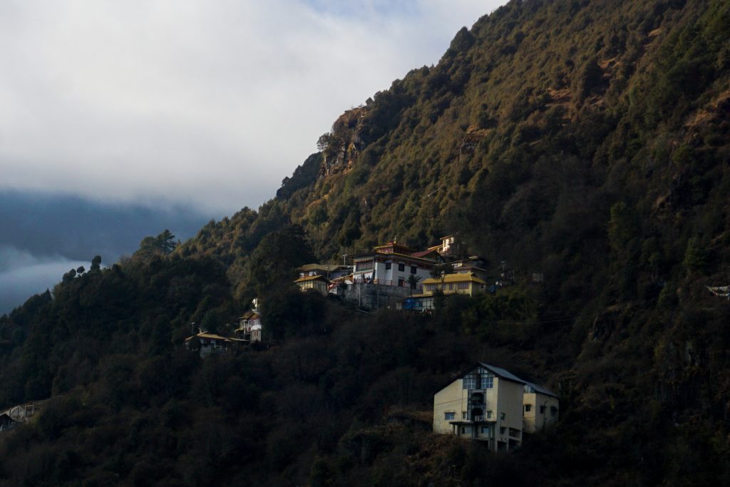 Gyangong Ani Gompa nestled in the mountains. This one is not fully accessible via motorable roads. The lower building is the non-operational cable-car station.