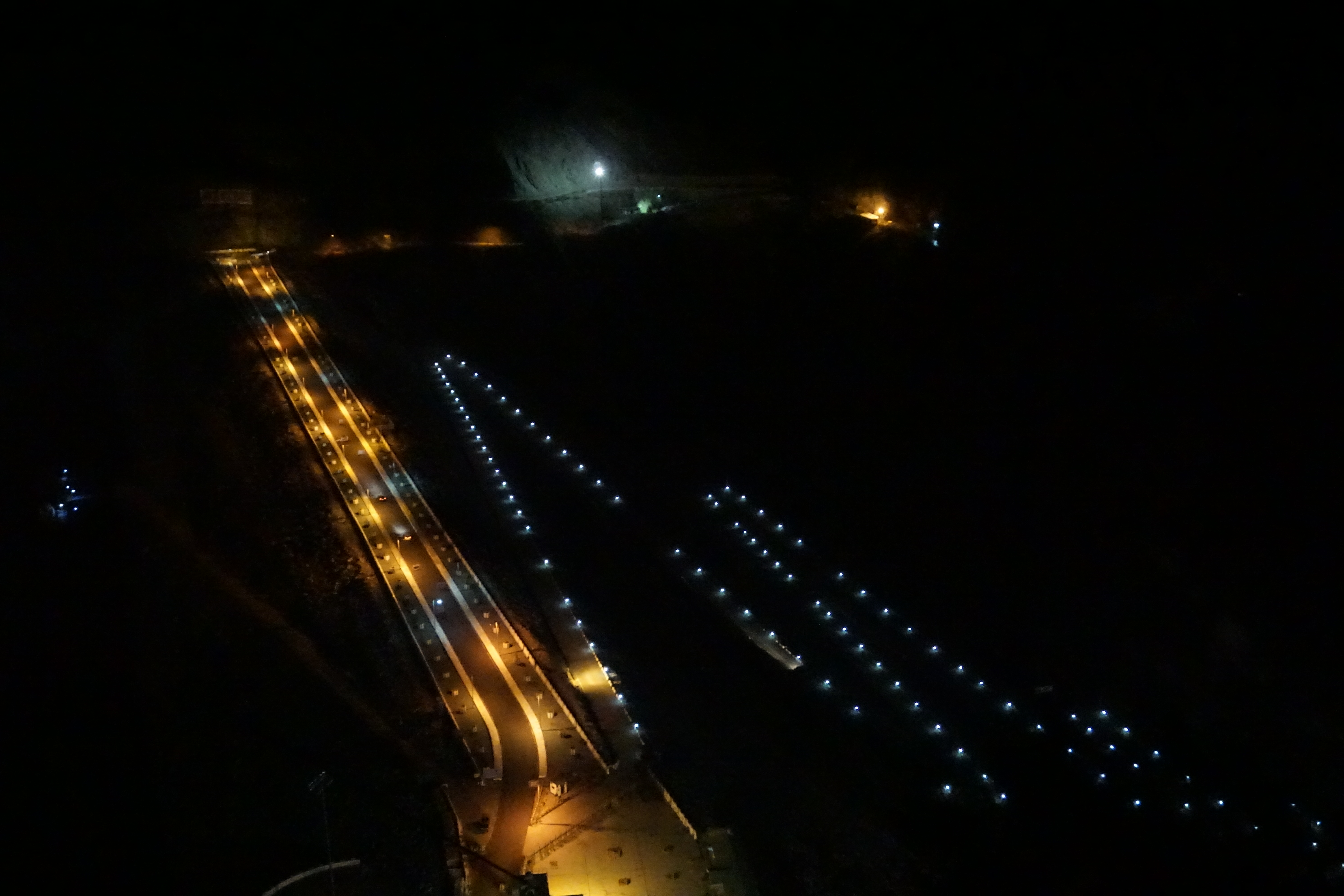 Tehri dam. Taking photographs on the dam road itself is prohibited. Mr. Moti Ram stopped above for a short smoking break when I clicked this photograph.