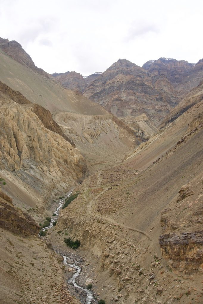 The thin streak of road that runs parallel to the right of the river is the way to the monastery. The monastery is well hidden from the casual motorbiker.