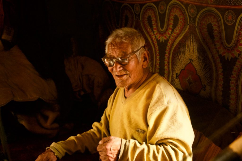 Lama Koncho Auzer. He couldn&rsquo;t speak Hindi that well. One of the chammos translated my request to take a photograph. He delightfully agreed.