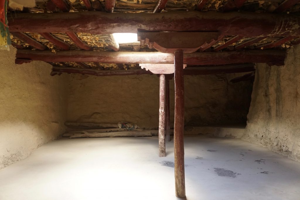 The stone and mud monastery has been reinforced and restored using wooden columns. I have seen these skylights even in modern mud houses.