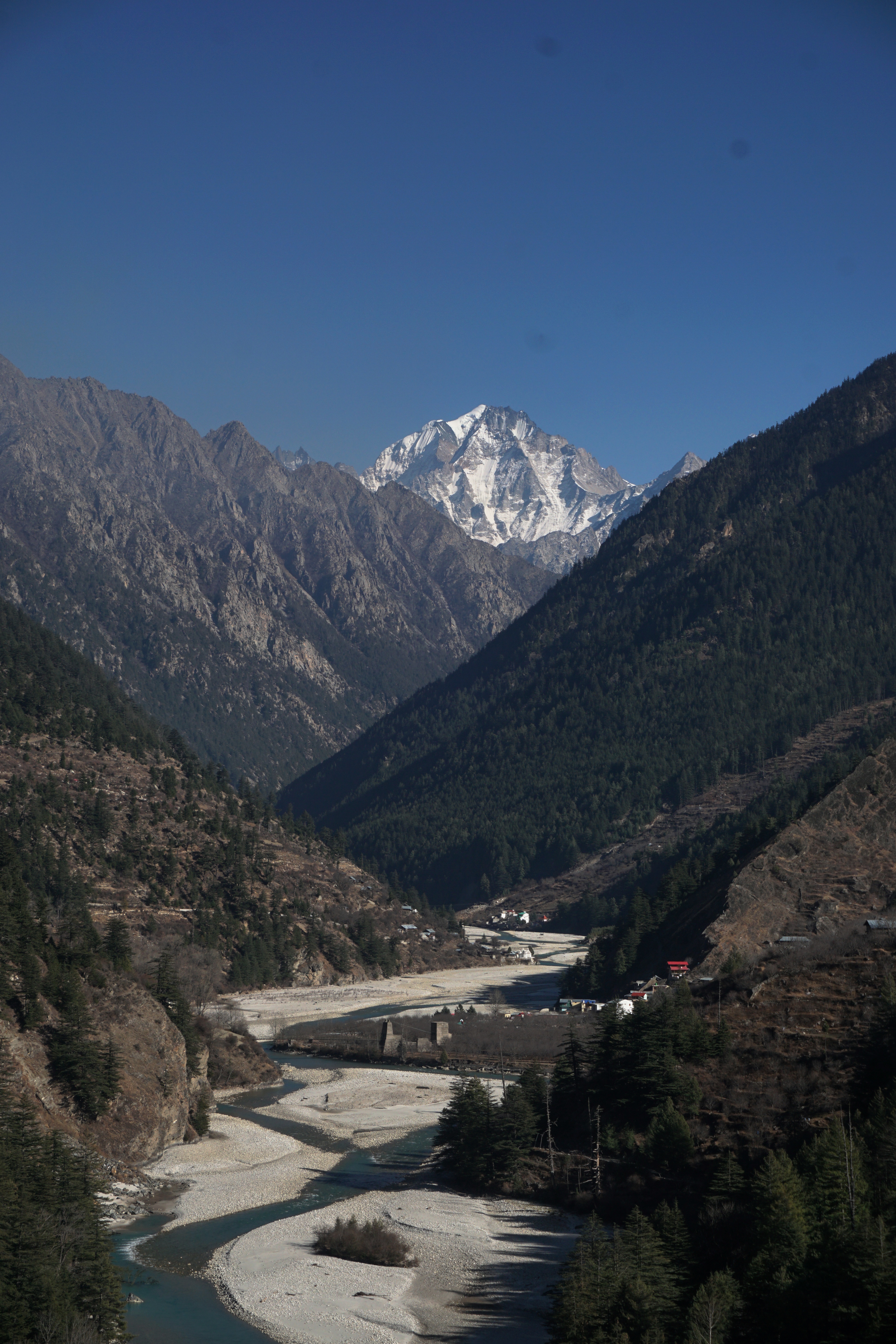 The beautiful Harsil valley cut by Bhagirathi river. That peak could be Meru parvat as I was told later. Since Mount Meru has been attributed in many spiritual and religious texts, it is highly possible that the peak could be something else.