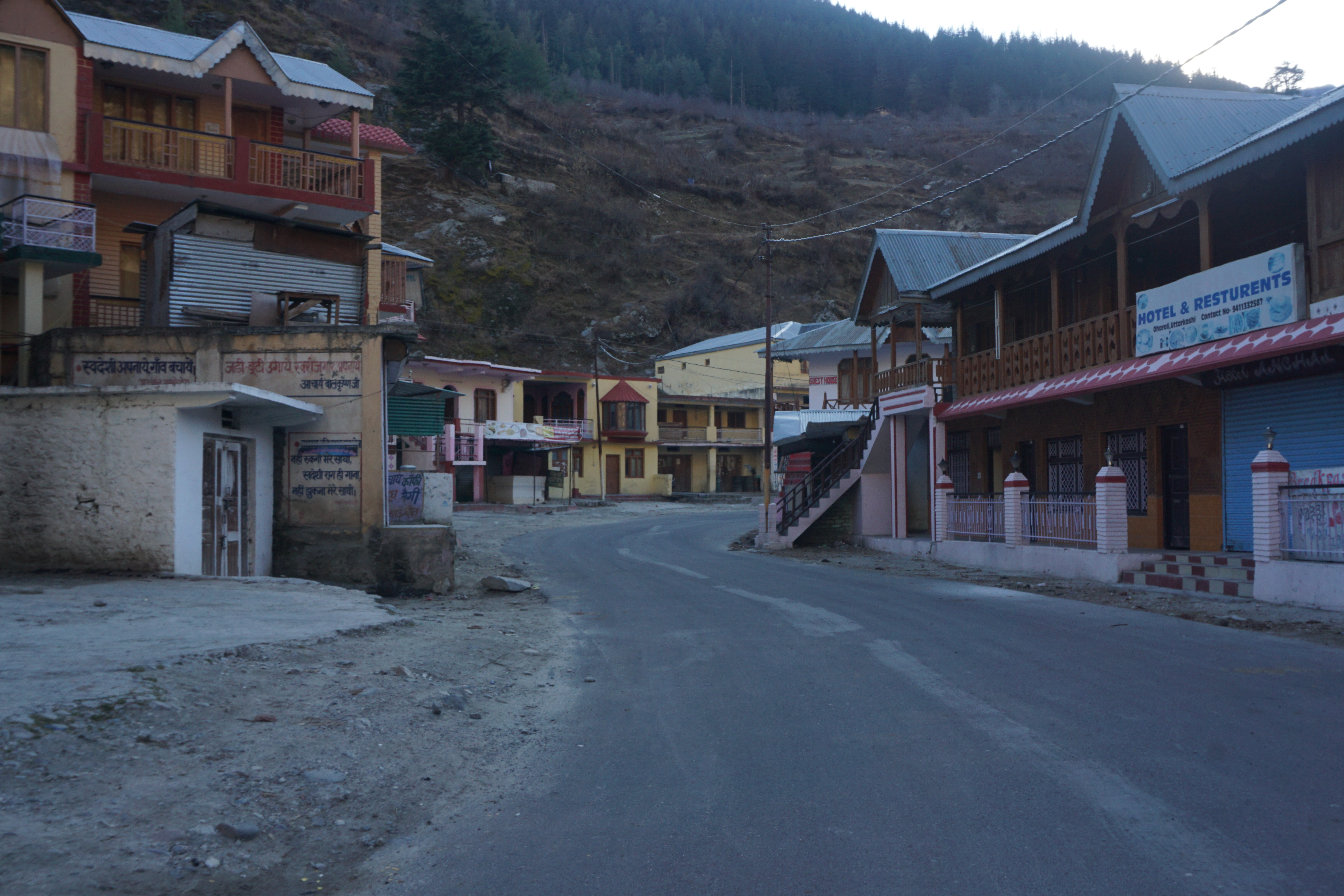 There was not a single soul in Dharoli. I think a solitary shop was the only one open. Few military men were enjoying some local hooch with omelette.