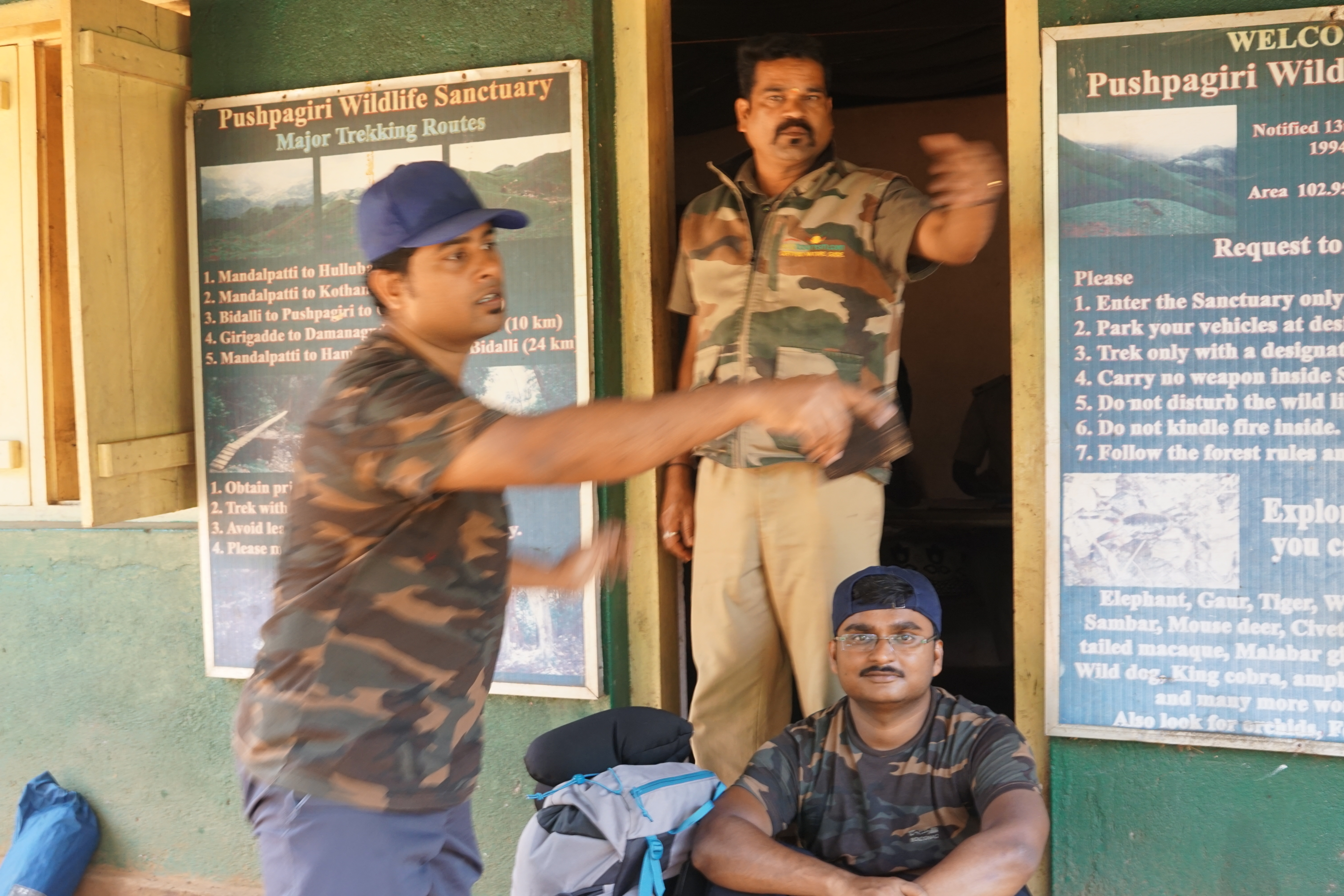 Korak taking some directions from the officer.