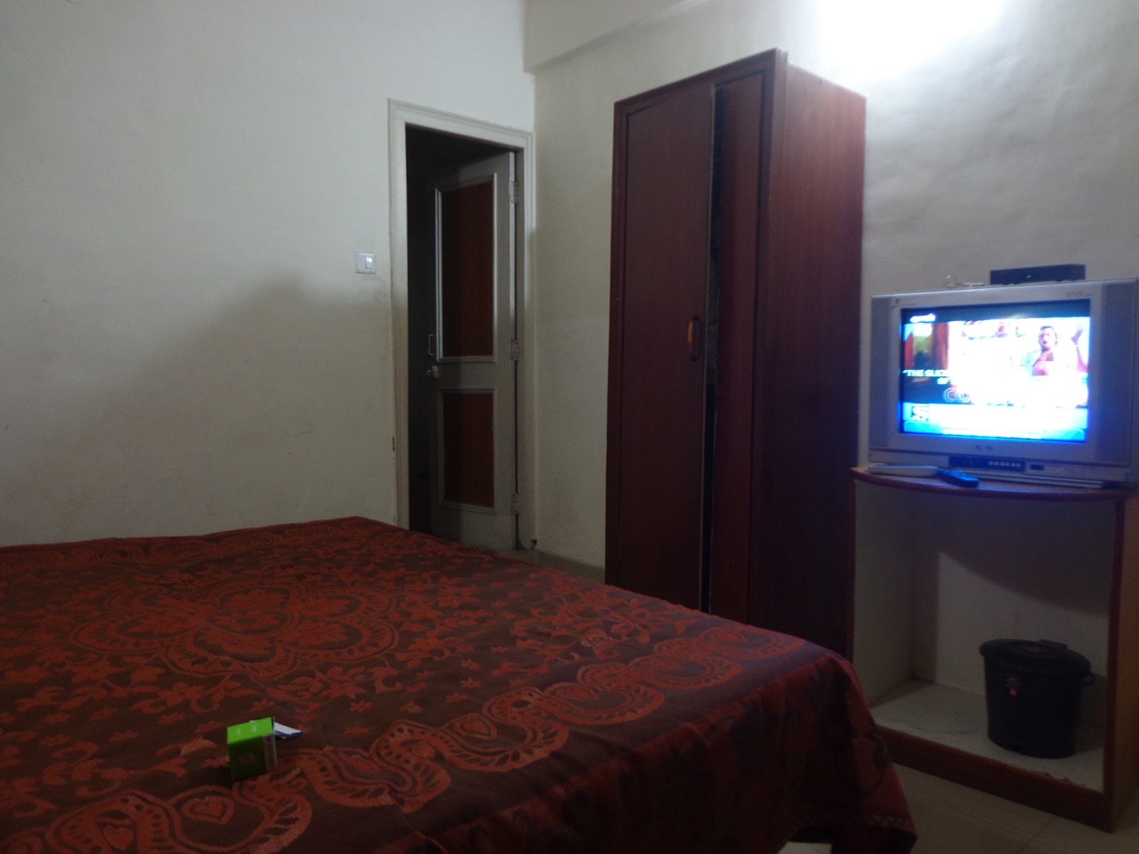 This is room 103 of Hotel Yatrika. The board declares in a relatively large font, Government Approved.