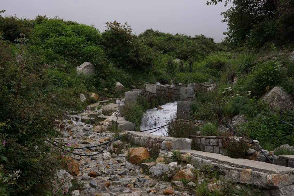 We had to cross this water stream—possibly Chitkul’s source of drinking water—to reach the base of the adjacent hill.