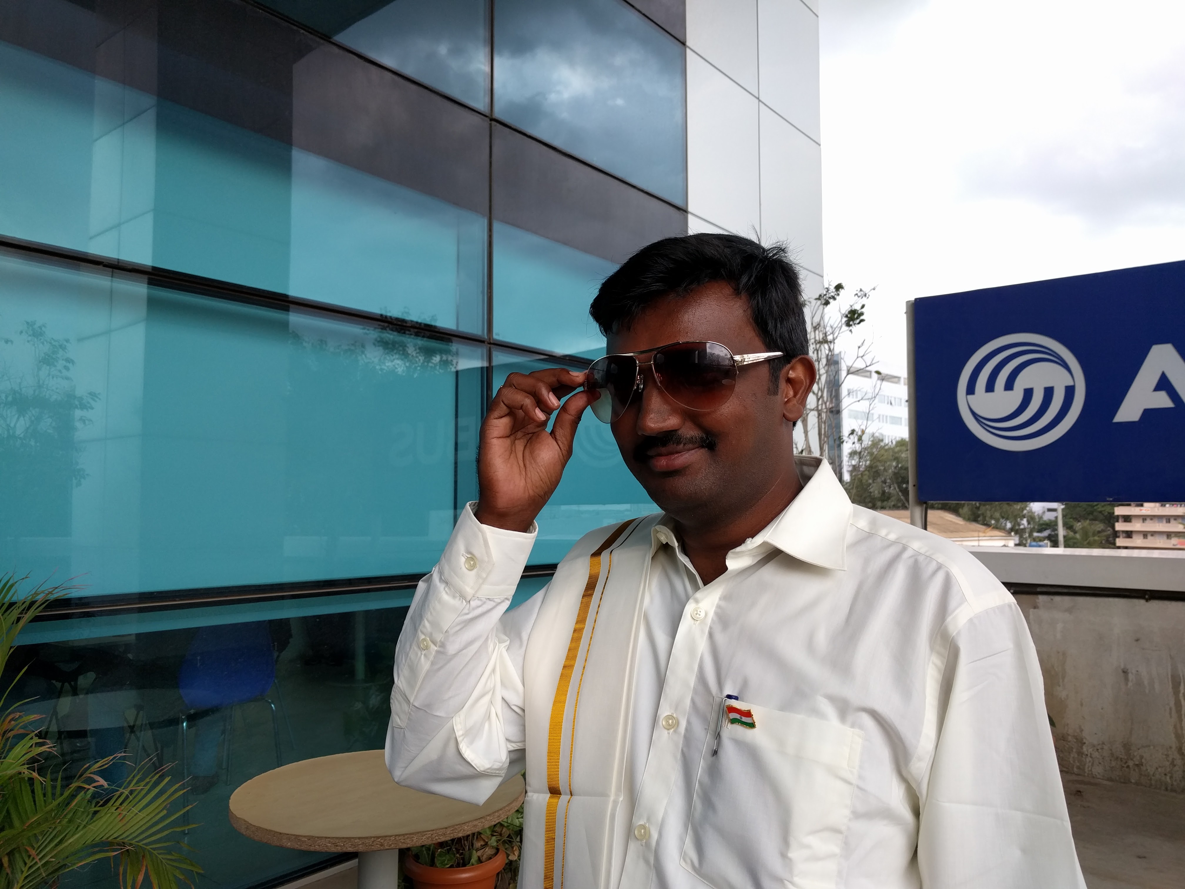 Surreal photo of the day. My colleague, Chinnarajan posing as a true South Indian politician.