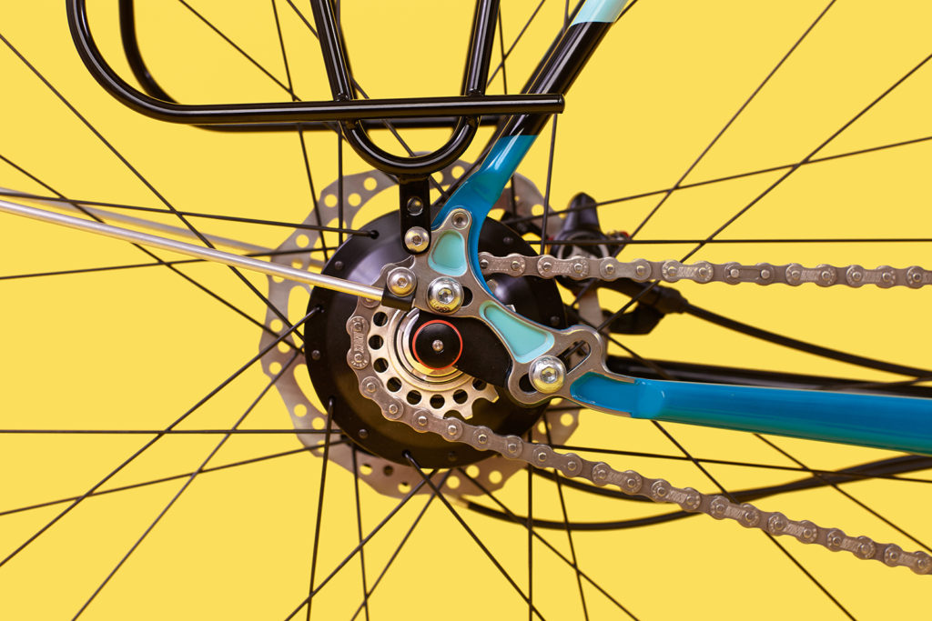 Notice the two mounting points near the rear dropout for fenders and panniers.