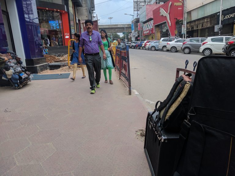 That pile of mud and the metal barricades mark the entrance to Church Street. I waited for Korak and Shounak with my equipment on the pavement.