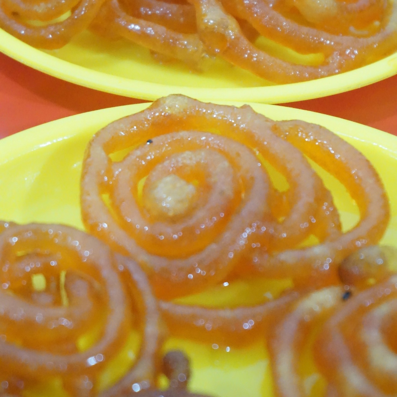 Since we couldn&rsquo;t go out in the rain, we ordered some jalebis and tea. These jalebis were okay. The tea was horrible. Guys abandoned their drinks halfway but I finished it nonetheless. I have a philosophy - &lsquo;Chai ko mana nahin karte.&rsquo;