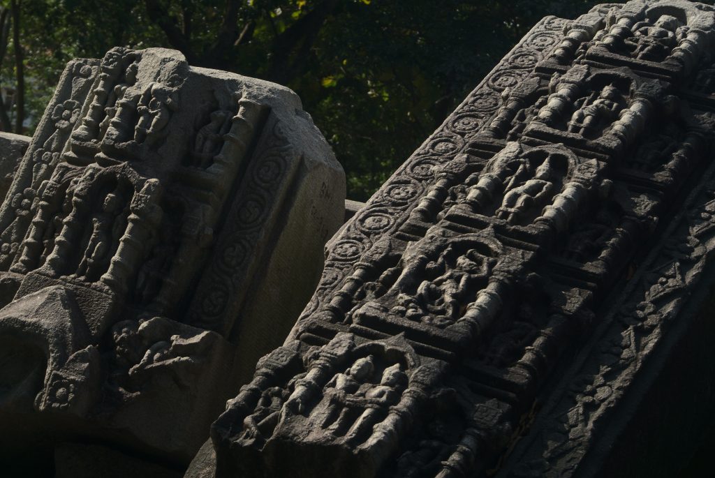 These carved stones might have been pillars of the temple. In the absence of any preserved structure, it is hard to know. ASI hasn’t put up any information, either.