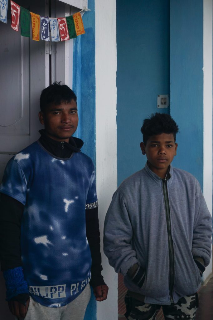Akash and Amit from Hotel Samdrupling. They were painting the balcony walls and preparing for the owner’s inspection who usually came once a month.