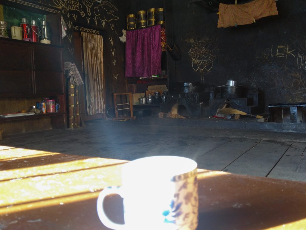 Inside the kitchen with the cup of tea Ani Themzing had offered me. If there is one principle I live by, it has to be this: “Never refuse a cup of tea.”