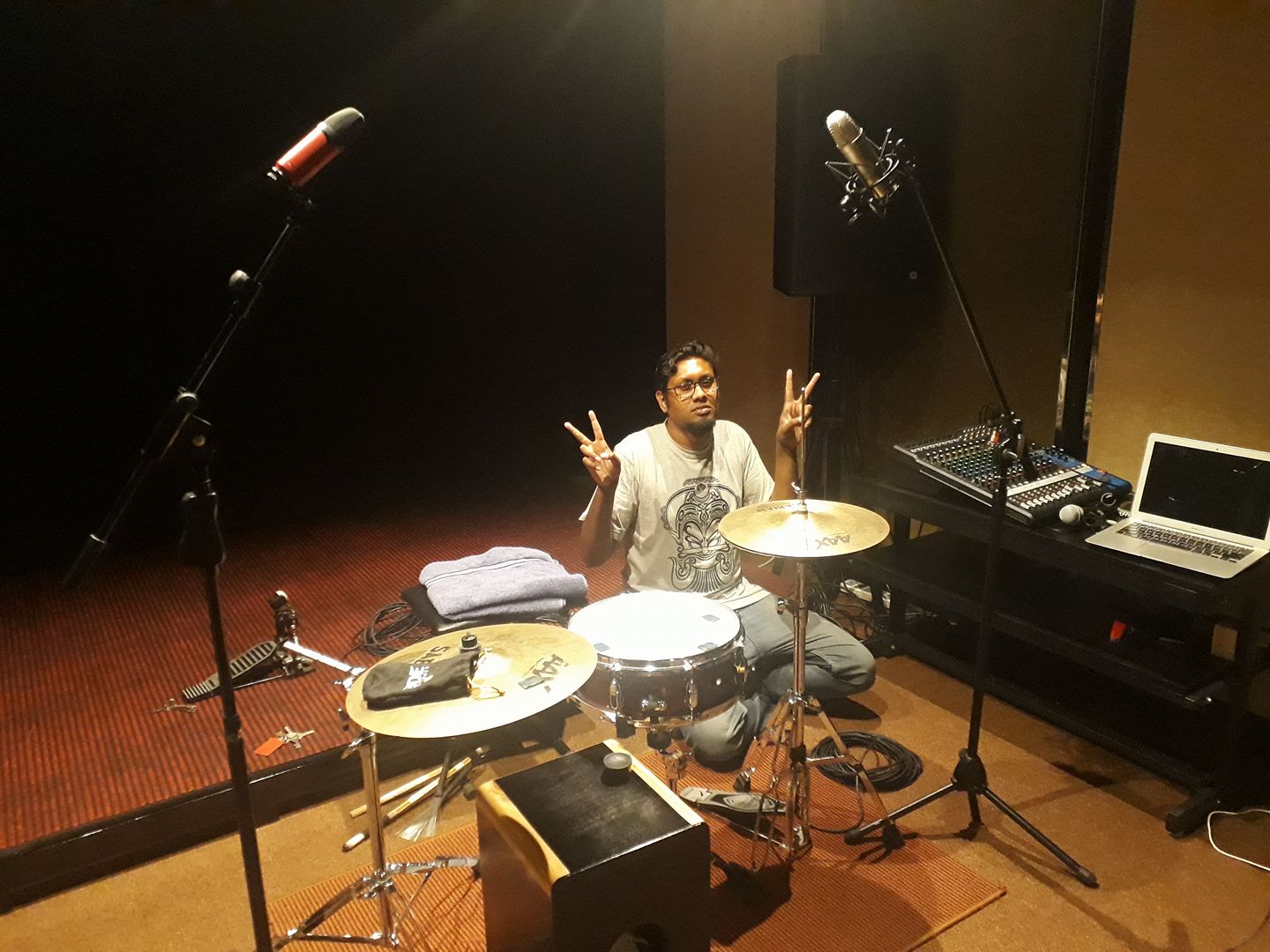 Shawn with his peace sign. Notice the mismatched overhead mics.