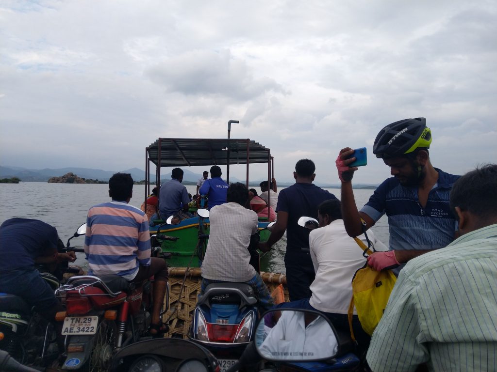 The coracle with motorbikes and our bicycles was dragged by the motorboat.