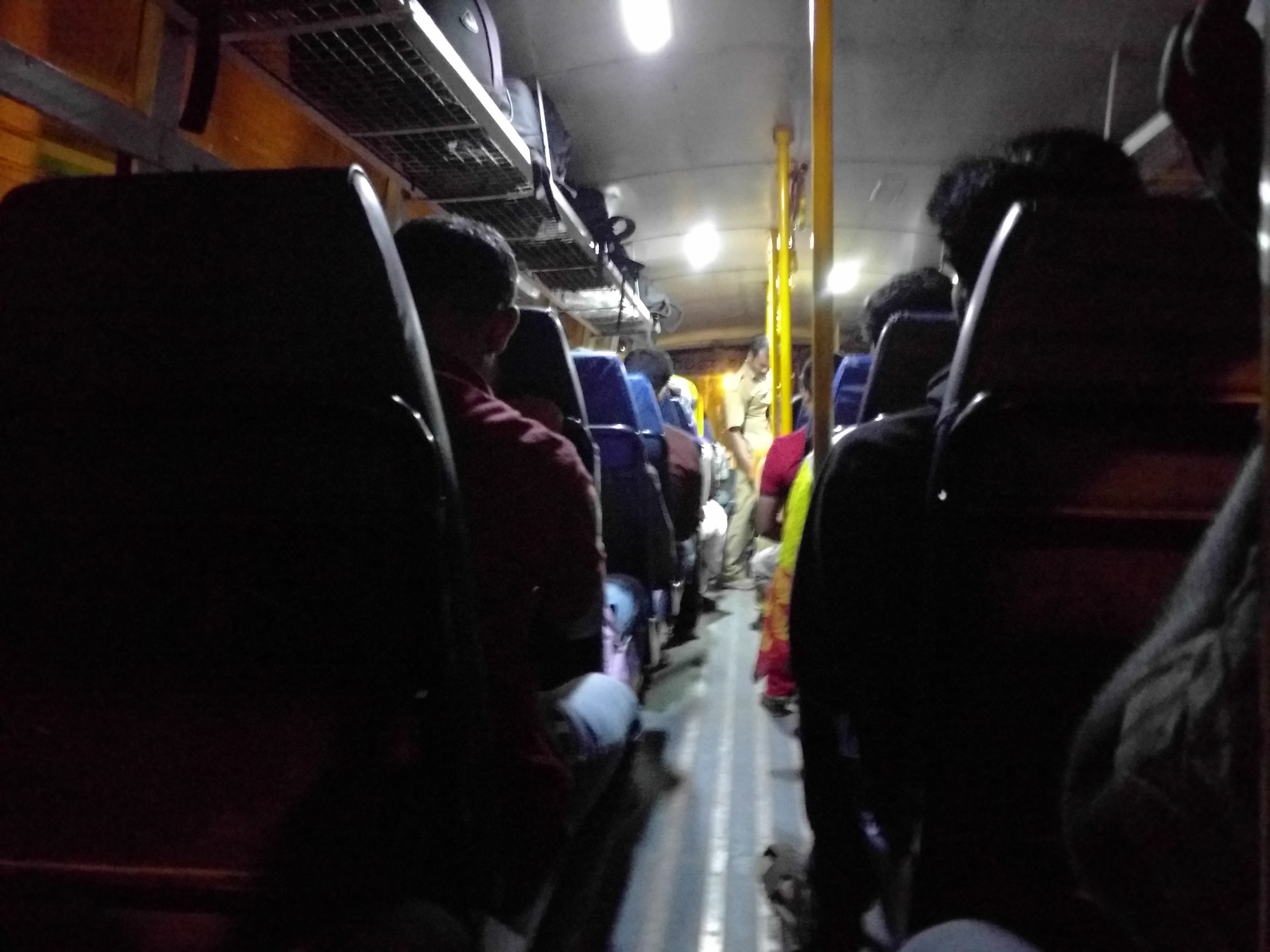 We paid INR 1082 for this trip per person. That includes the 750 rupees worth of AC sleeper berths that we missed. Here we were, on a bus not suitable for overnight trips, sitting on the last row, where the motion on each pothole and bump got amplified.